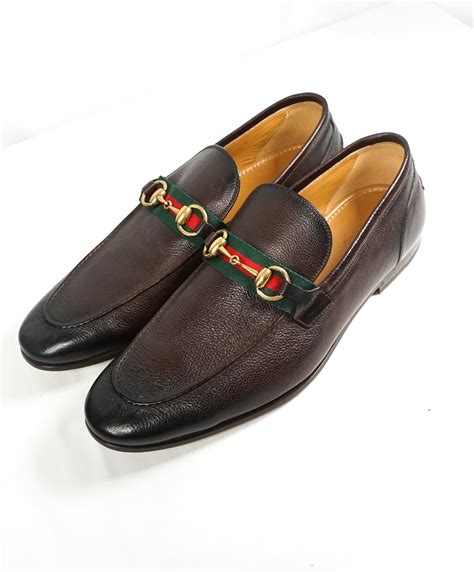 gucci loafers with red stripe.